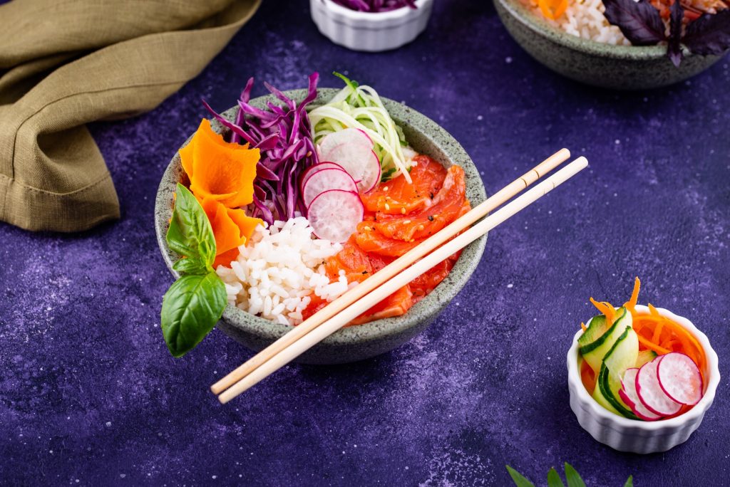 Hawaiian poke bowl with salmon and shrimps